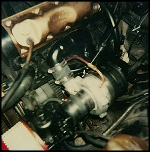 first iteration of our turbo installation, using a side-draft, single-barrel carburetor
