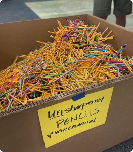 pencils in large box for donation